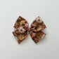 Garden Floral on Rust Hand-tied Bow